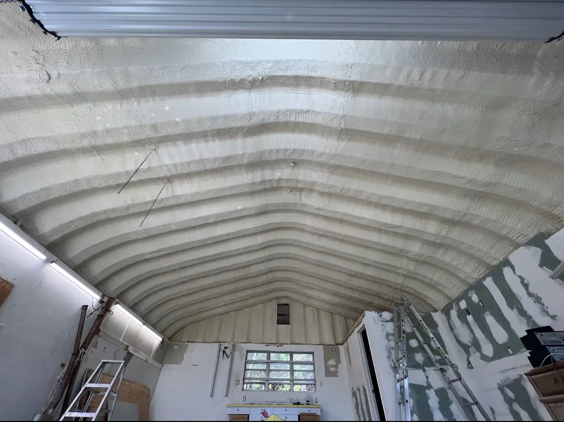 Spray polyurethane foam applied to the underside of a metal roof deck in Ferndale